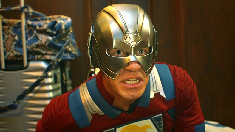 The Earth-2 Peacemaker (John Cena) prepares to launch a pair of helmet-fired ninja stars in Peacemaker Season 2 Episode 1 "The Ties That Grind" (2025), DC Studios