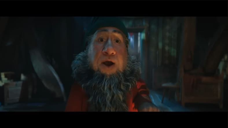 Doc The lead dwarf (voiced by Jeremy Swift) surprised to see Snow White (Rachel Zegler) in bed in Disney's Snow White, 2025, Walt Disney Pictures