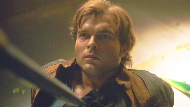 Han (Alden Ehrenreich) finds himself at the mercy of Qi'ra (Emilia Clarke) in Solo: A Star Wars Story (2018), Disney/Lucasfilm