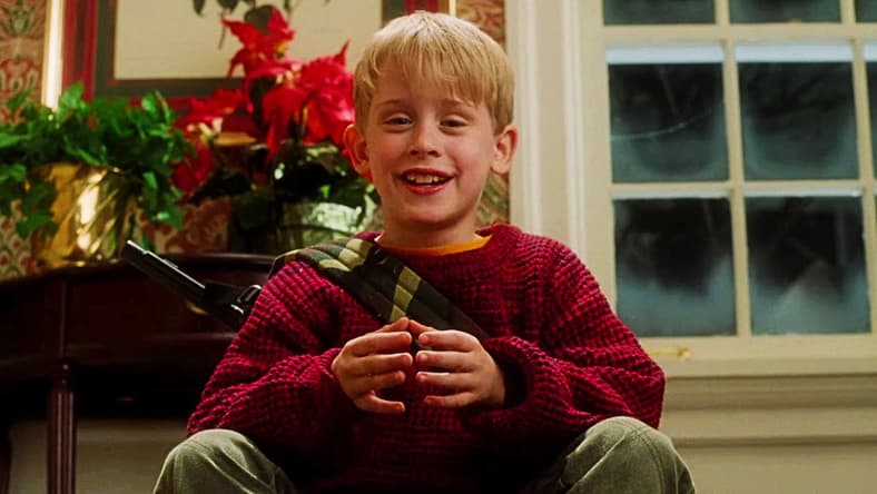 Kevin (Macaulay Culkin) is ready for more in Home Alone (1990), 20th Century Fox