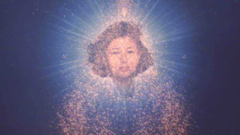 Erika's (Yasuko Sawaguchi) soul ascends so SpaceGodzilla can be born in Godzilla vs. Biollante (1989), Toho Co. Ltd.