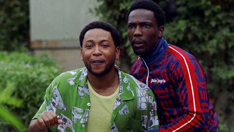 Kevin and Damon are surprised by a visitor in House Party (2023), Warner Bros. Pictures