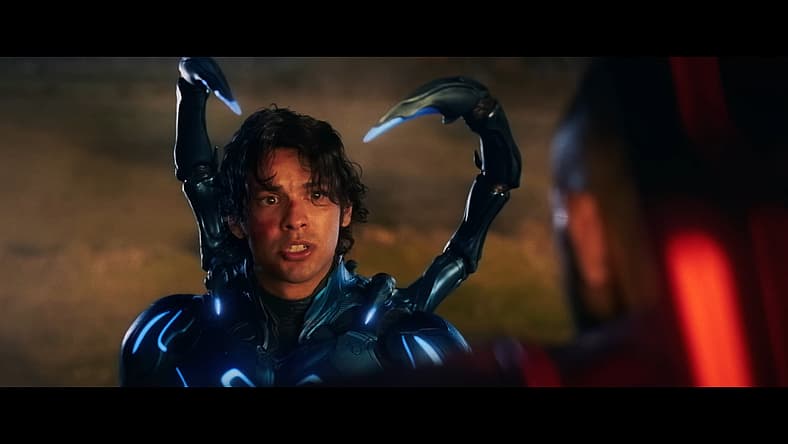 Jamie Reyes (Xolo Maridueña) confronts Carapax (Raoul Max Trujillo) in Blue Beetle (2023), DC