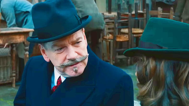 Hercule Poirot (Kenneth Branagh) intrigued by Ariadne Oliver (Tina Fey) in A Haunting in Venice