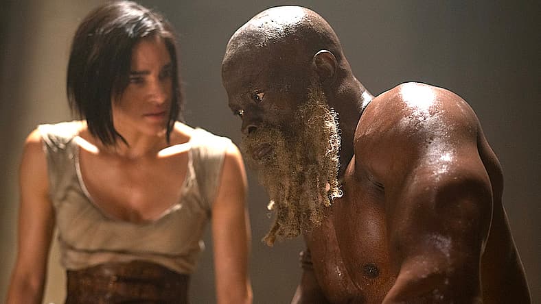 Sofia Boutella as Kora and Djimon Hounsou as Titus in Rebel Moon, Netflix