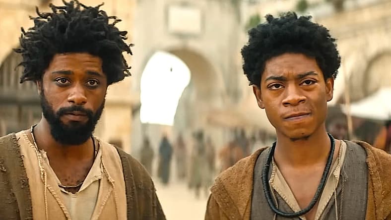 LaKeith Stanfield as Clarence and RJ Cyler as Elijah in The Book of Clarence (2023)