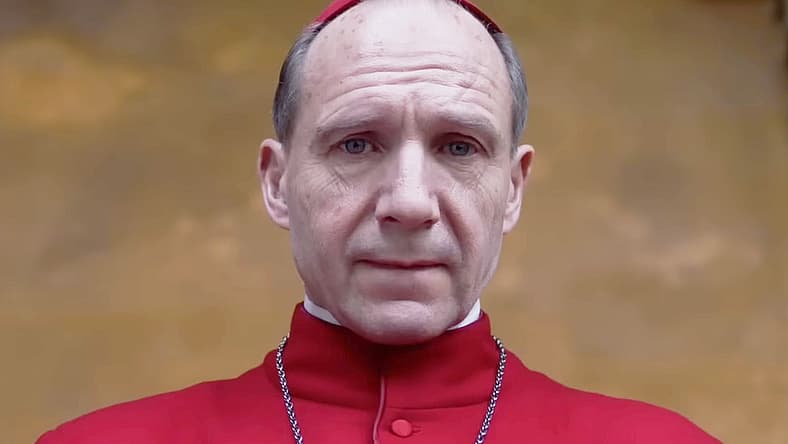 Cardinal Lawrence (Ralph Fiennes) prepares to deliver a speech in Conclave (2024), Focus Features