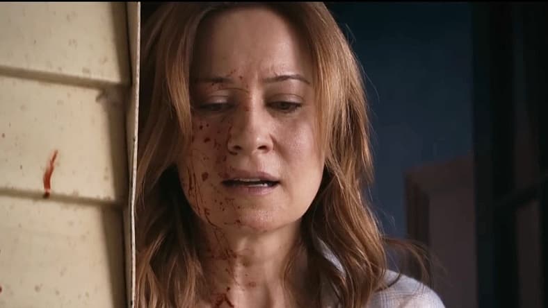 Camille Sullivan is stunned by what Amazon left on her porch in Shelby Oaks (2025), Neon