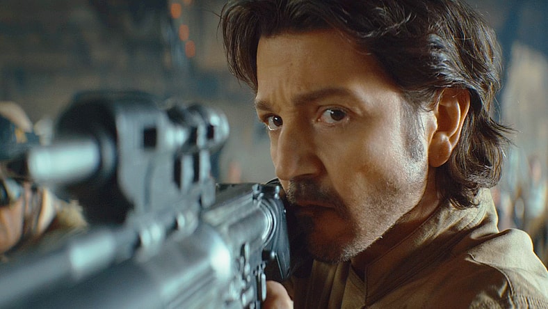 Cassian Andor (Diego Luna) demands that K2 (Alan Tudyk) be returned to him in Andor Season 2 Episode 9 "Welcome to the Rebellion" (2025), Lucasfilm