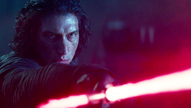 Kylo Ren (Adam Driver) draws his light saber in Star Wars Episode IX - The Rise of Skywalker (2019), Lucasfilm
