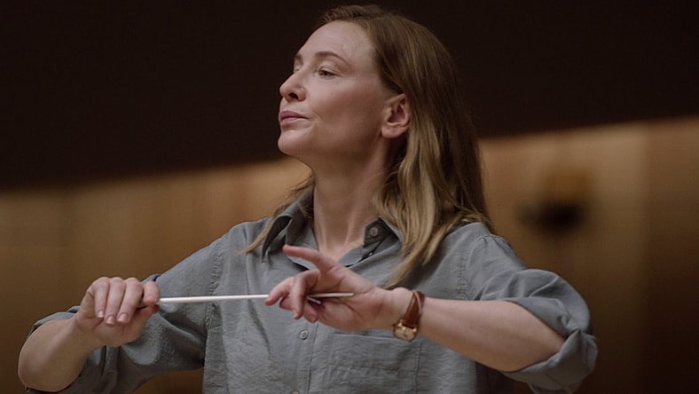 Lydia Tár (Cate Blanchett) readies herself to conduct via Tár (2022), Universal Pictures