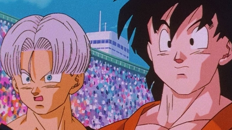 Goten (Masako Nozawa) and Trunks (Takeshi Kusao) are shocked to see Goku (Masako Nozawa) alive and well at the World Tournament in Dragon Ball Z Episode 291 "Goku's Next Journey" (1996), Toei Animation via Blu-ray