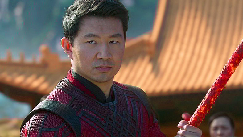 Shang-Chi (Simu Liu) stands ready to defend Tao Lo from the Ten Rings in Shang-Chi and the Legend of the Ten Rings (2021), Marvel Entertainment via Blu-ray