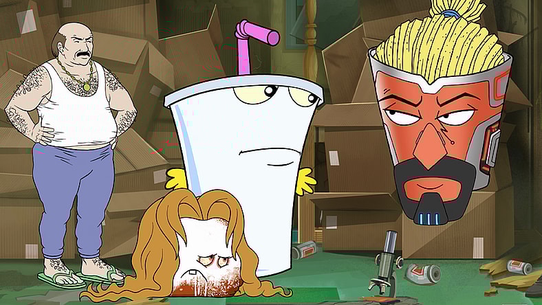 Frylock (Carey Means) formulates a plan with Master Shake (Dana Snyder), Meatwad (Dave Willis) and Carl (Dave Willlis) in Aqua Teen Forever: Plantasm (2022) Williams Street via Blu-ray