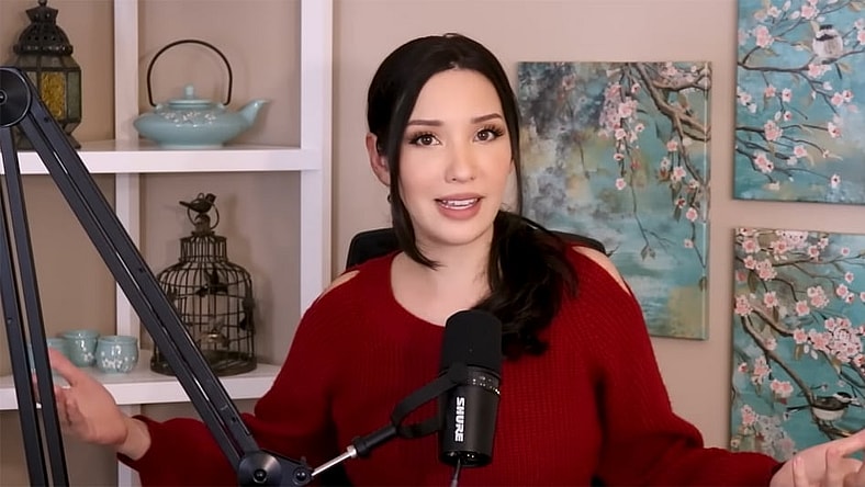 Lauren Chen in a red sweater on her Mediaholic YouTube channel.