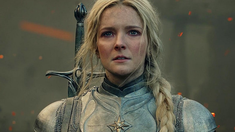 Galadriel (Morfydd Clark) stands alone in the immediate aftermath of the eruption of Mt. Doom in The Lord of the Rings: The Rings of Power Season 1 Episode 6 "Udûn" (2022), Amazon Studios