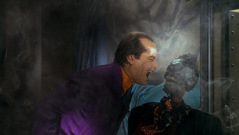 The Joker laughs at the corpse of a mob boss in 'Batman' (1989), Warner Bros. Pictures