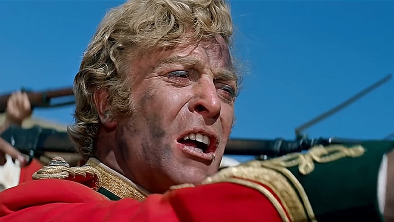 Lt. Gonville Bromhead (Michael Caine) orders his troops to fire in Zulu (1964), Diamond Films