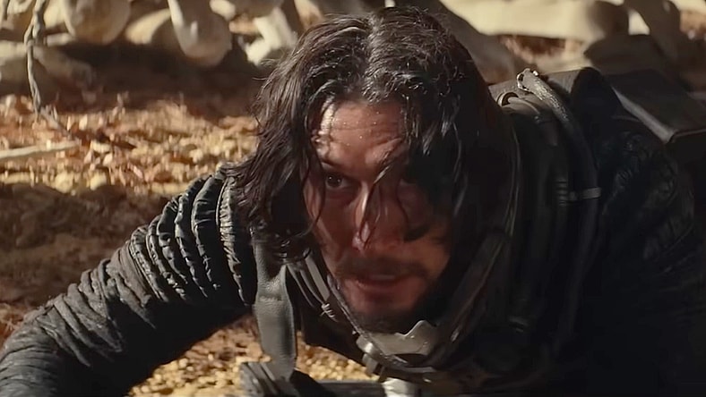 Mills (Adam Driver) is taken by surprise in 65 (2023), Sony Pictures