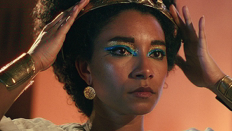 Heavy is the head that wears Cleopatra's (Adele James) crown in Queen Cleopatra (2023), Netflix