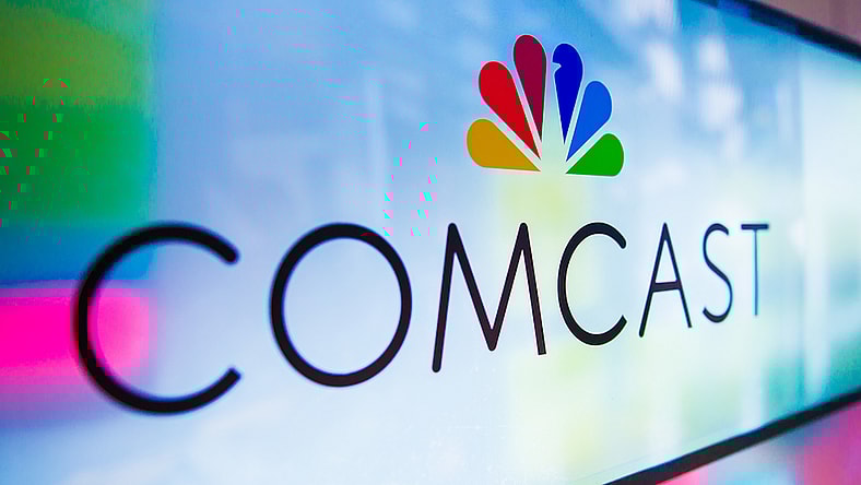 The company logo on a screen via Comcast