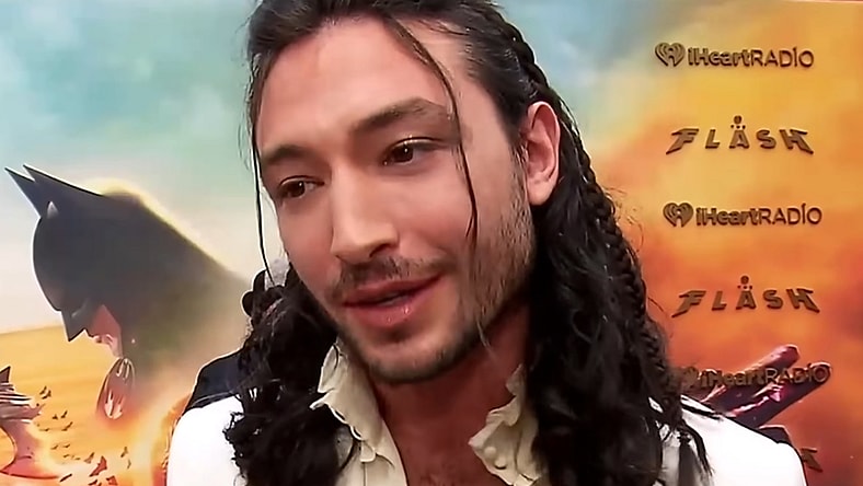 Ezra Miller speaks to TheMovieReport.com on The Flash's red carpet