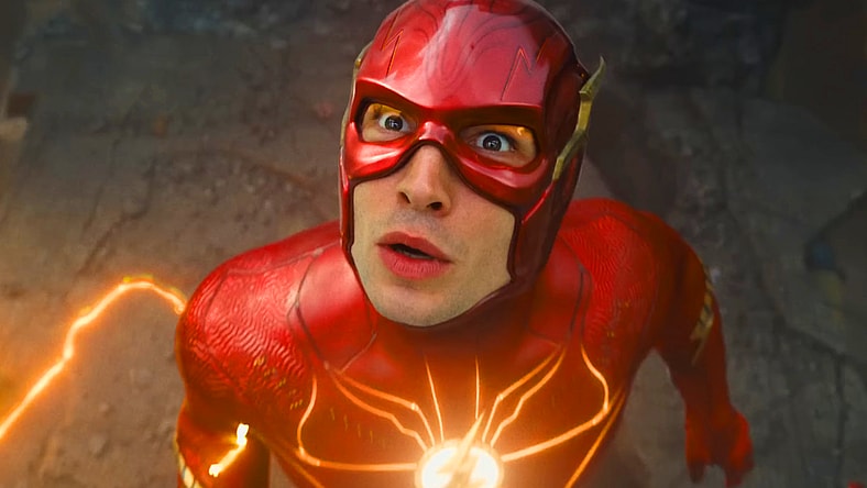 Barry Allen (Ezra Miller) watches as a hospital collapses in The Flash (2023), Warner Bros. Pictures