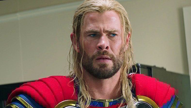 Thor (Chris Hemsworth) receives some bad news in Thor: Love and Thunder (2022), Marvel Entertainment