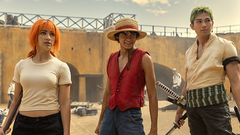 One Piece. (L to R) Emily Rudd as Nami, Iñaki Godoy as Monkey D. Luffy, Mackenyu Arata as Roronoa Zoro in season 1 of One Piece. Cr. Casey Crafford/Netflix © 2023