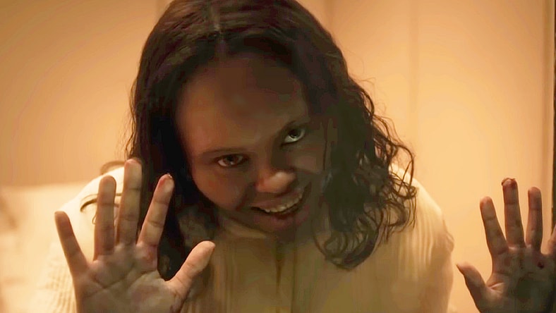 Angela (Lidya Jewett) finds herself in the swings of full possession in The Exorcist: Believer (2023), Universal Pictures