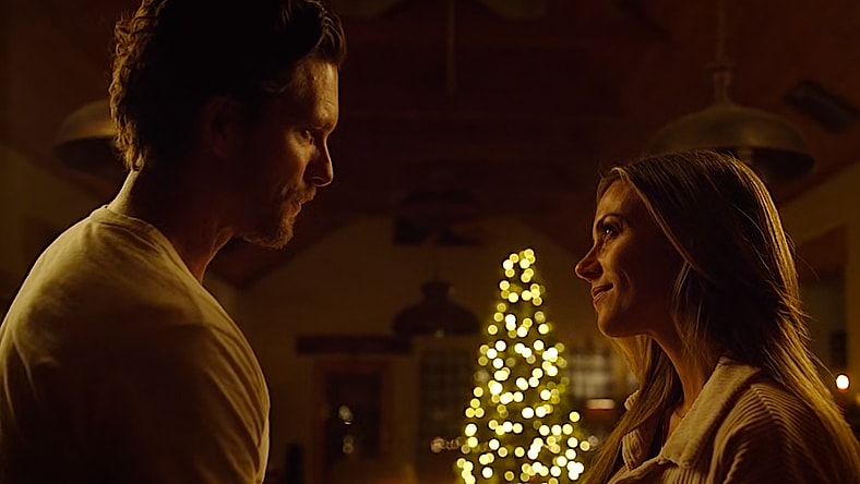 Jana Kramer as Lexie Crenshaw and Adam Senn as Coby Mason in A Cowboy Christmas Romance (2023), Lifetime