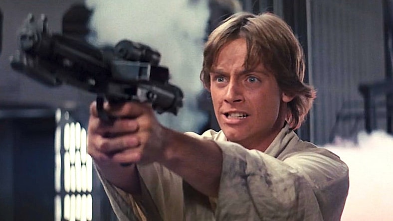Luke Skywalker (Mark Hamill) blast some Stormtroopers in Star Wars Episode IV: A New Hope (1977), Lucasfilm