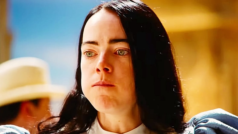 Bella (Emma Stone) contemplates more in Poor Things (2023), Searchlight Pictures