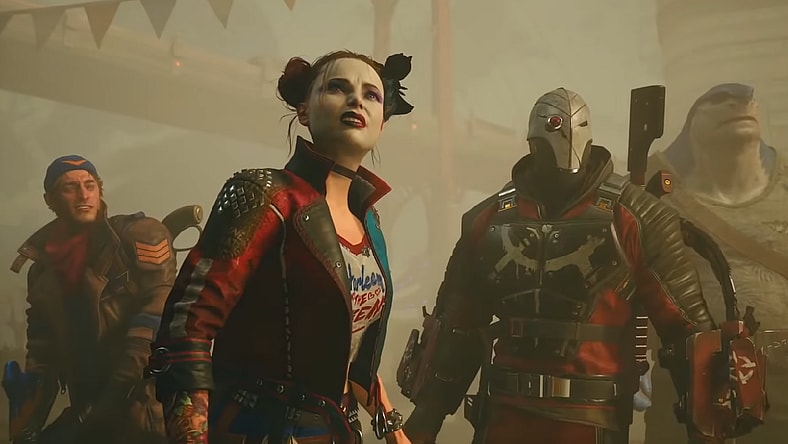 Captain Boomerang (Daniel Lapaine), Harley Quinn (Tara Strong), Deadshot (Bumper Robinson), and King Shark (Samoa Joe) stare in confusion through dust and debris via Suicide Squad: Kill the Justice League (2023), Warner Bros. Games