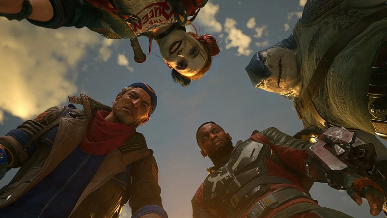 Harley Quinn (Tara Strong), King Shark (Samoa Joe), Deadshot (Bumper Robinson), and Captain Boomerang (Daniel Lapaine) stare downwards in Suicide Squad: Kill the Justice League (2024), Rocksteady Studios