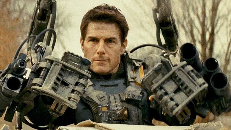 Major Cage (Tom Cruise) guns down an attacking Mimic in Edge of Tomorrow (2014), Warner Bros. Pictures