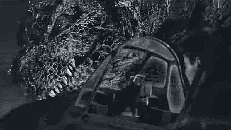 Godzilla's first form on Odo Island attacks in Godzilla Minus One/Minus Color (2023), Toho Co. Ltd.