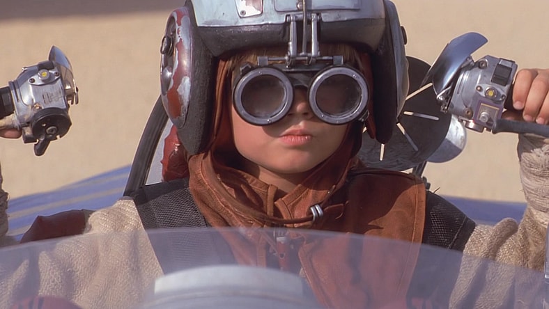 Anakin Skywalker (Jake Lloyd) knows that THIS is pod racing in Star Wars: Episode I - The Phantom Menace (1999), Lucasfilm