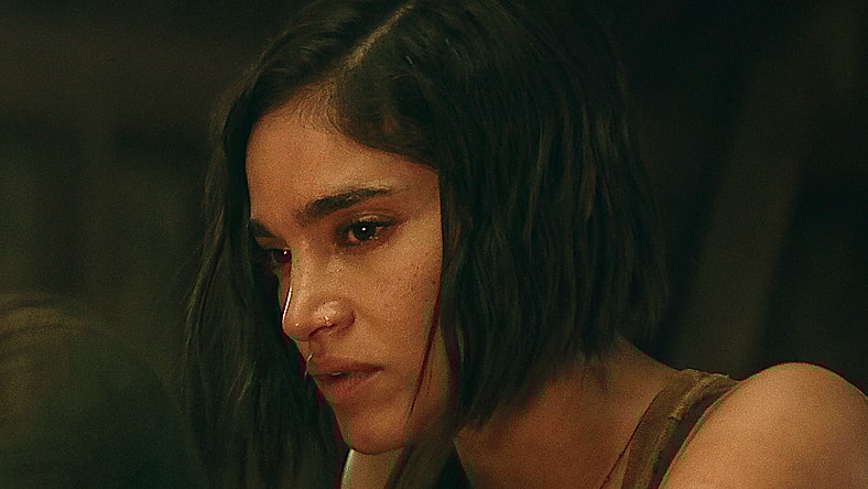 Rebel Moon — Part Two: The Scargiver. (L-R) Michiel Huisman as Gunnar and Sofia Boutella as Kora in Rebel Moon — Part Two: The Scargiver. Cr. Netflix © 2024.