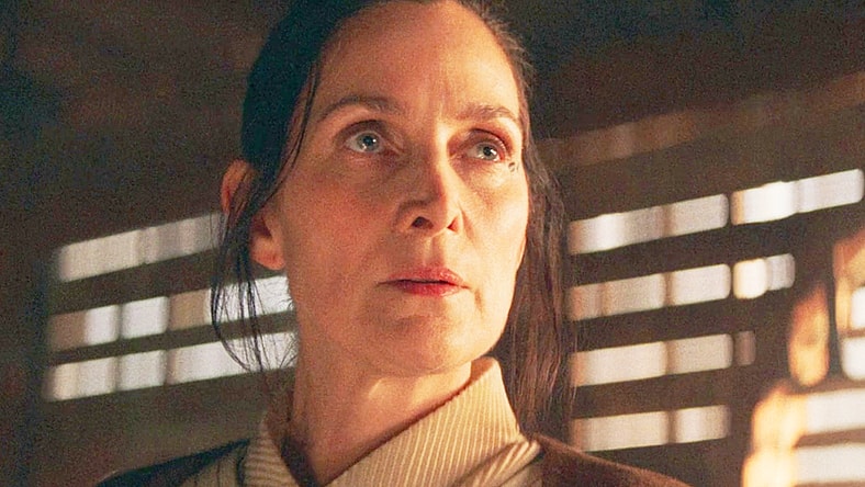 Jedi Master Indara (Carrie-Anne Moss) prepares to defend herself from Mae (Amandla Stenberg) in The Acolyte Season 1 Episode 1 "Lost/Found" (2024), Disney