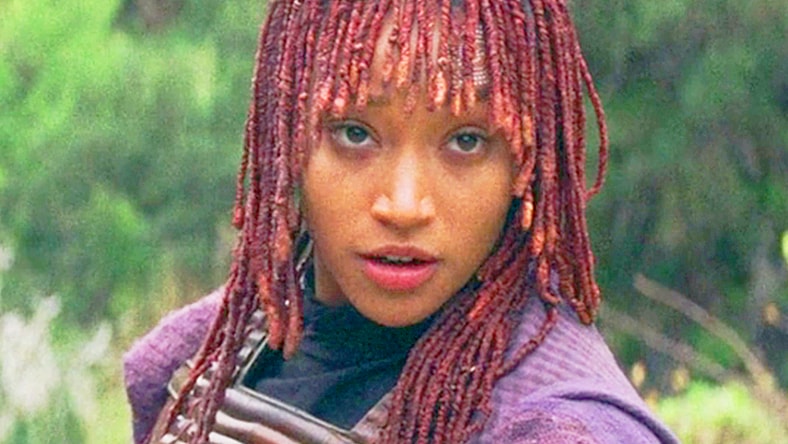 Mae (Amandla Stenberg) is reluctant to heed Qimir's (Danny Jacinto) travel advice in The Acolyte Season 1 Episode 4 'Day' (2024), Disney