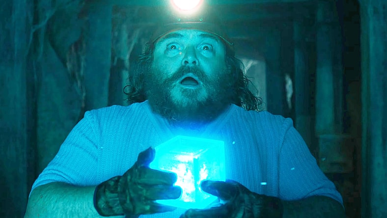 Steve (Jack Black) discovers a portal to a blockier world in A Minecraft Movie (2025), Warner Bros. Pictures