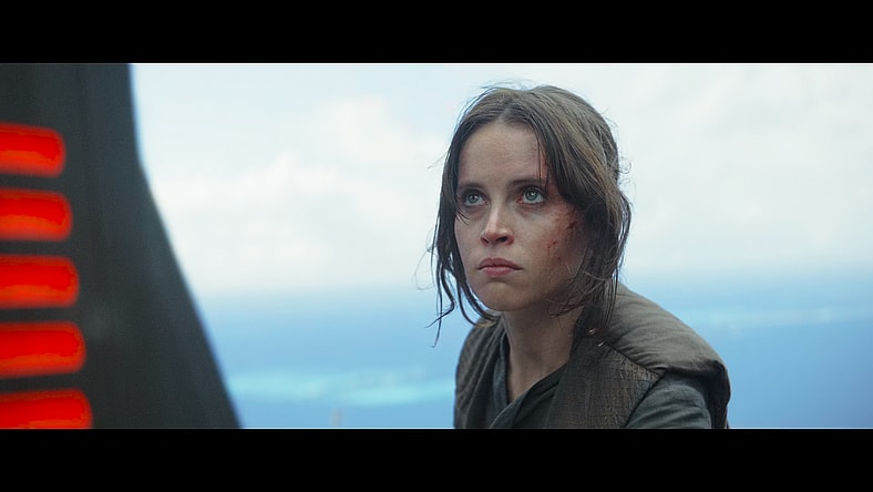 Jyn Erso (Felicity Jones) sends the Death Stars plans to the Rebel Alliance in Rogue One: A Star Wars Story (2016), Lucasfilm