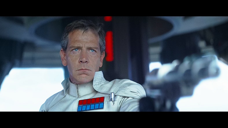 Cassian Andor (Diego Luna) gets the drop on Jyn Erso (Felicity Jones) in Rogue One: A Star Wars Story (2016), Lucasfilm