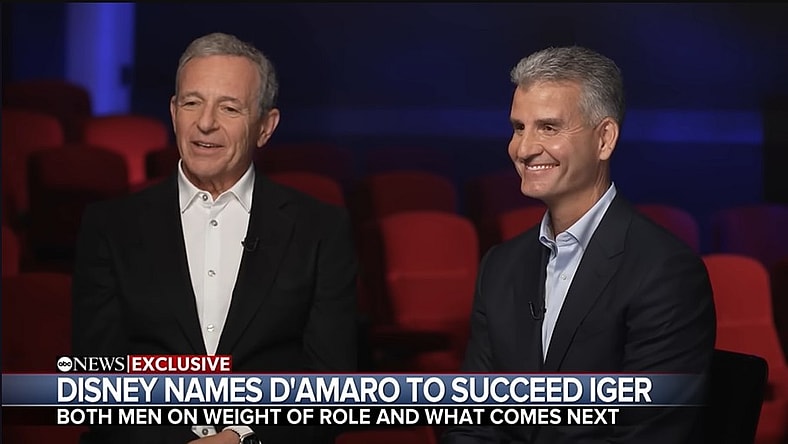 Disney 's Former CEO Bob Iger and new CEO Josh D'Amaro speaking about the company's AI future in an interview, ABC News, 2026, via YouTube