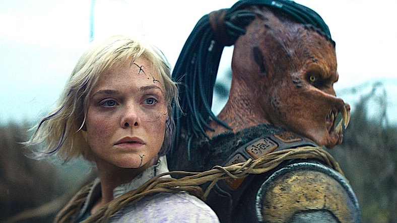 Thia (Elle Fanning) and Dek (Dimitrius Schuster-Koloamatangi) team up in Predator: Badlands (2025), 20th Century Studios