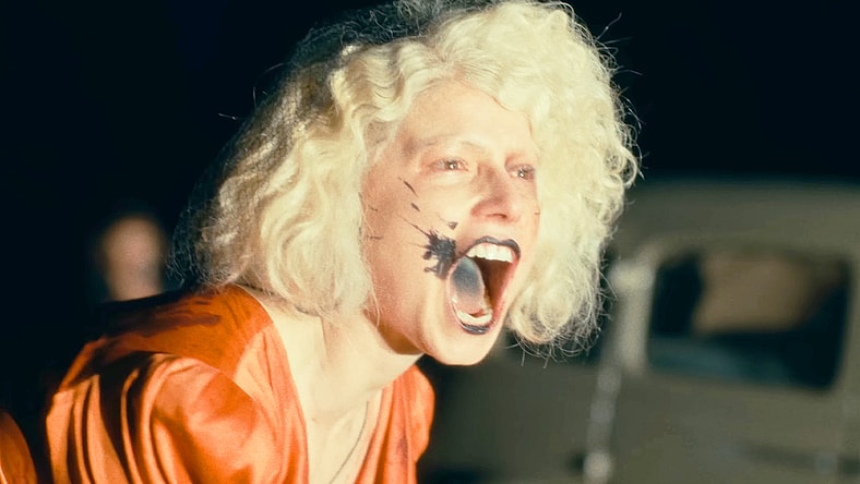 The Bride (Jessie Buckley) roars defiantly against the police in The Bride! (2026), Warner Bros. Pictures