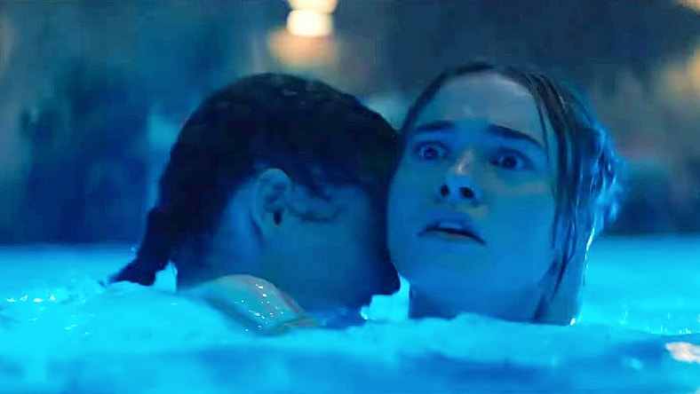 Johnny Sequoyah and Jessica Alexander take an intimate dip at the wrong time in Primate (2026), Paramount Pictures
