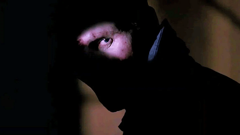 Dr. Peyton Westlake (Liam Neeson) looks at Julie (Frances McDormand) one final time in Darkman (1990), Universal Pictures