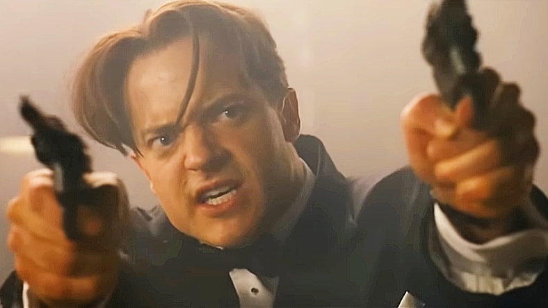 Brendan Fraser is cocked, locked, and loaded for another round in The Mummy: Tomb of the Dragon Emperor (2008), Universal Pictures